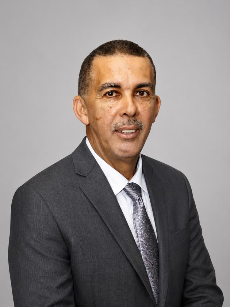 Mr. Justice H.E. Anthony Carmona SC ORTT (Silk)
